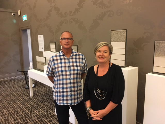 Donald Williams and Lisa Warrener of Global Art Projects at the Sofitel in front of a new ceramic exhibition they curated
