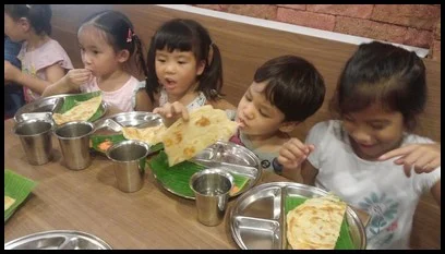 After the walk, everyone proceeded to Woodlands Madras restaurant to complete the Deepavali experience. The children savoured every bite of their prata.