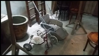 Babies were put in a sarong and the children had tricyles to play with while their parents worked at the sewing machine.