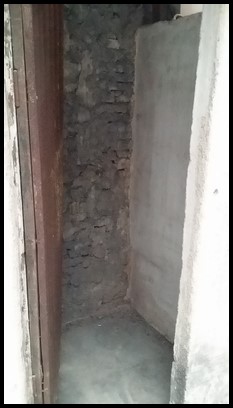 There were no shower heads. Everyone would take the amount of water that they needed into the shower.