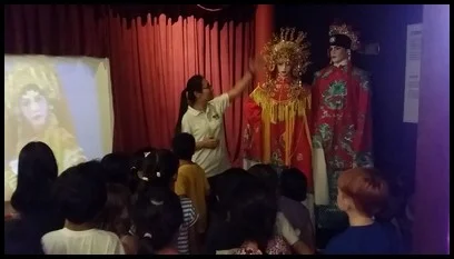 As not everyone could afford their own television, many would look watch the chinese opera.