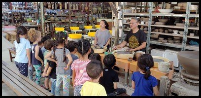  The children also watched a demonstration by Mr Lee and Ms Stella on how a bowl is made using clay on a potter's wheel. 