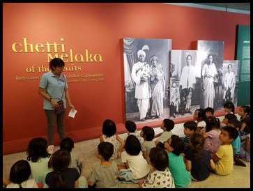  Mrs. Geraldine spoke to the children about the Chetti Melaka. Many years ago, Tamil traders came from India and settled in Melaka (near Johor Bahru in Malaysia). When they were in Melaka, some of them married women of Malay and Chinese descent. 