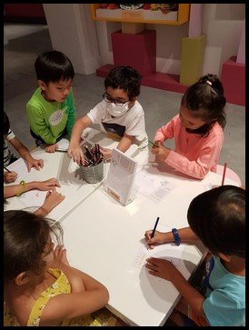  The children then broke off into groups and were given time to explore the activities around the exhibit. One of them included a drawing activity which involved the children to display their creativity by designing their own food packaging for the f