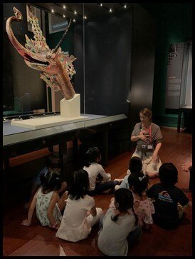  The children sat down and listened to a story on how the Makara got it’s jaw from the crocodile. Once, there was a mighty elephant that was boastful and constantly won many races among other animals. One day, it was challenged by a crocodile as it w