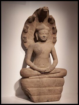  After, they were taken to view another artefact which had the buddha sheltered by the naga – a serpent deity shown as a multi headed cobra. 