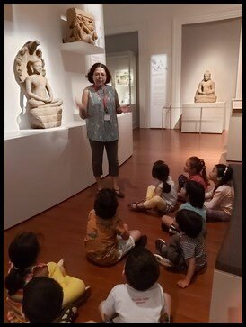  Ms Anisha and Ms Ambica shared a story on how the naga protected the buddha from a flood that happened a long time ago. When the buddha was busy meditating, the heavens darkened for seven days and a heavy rainfall started. As soon as it started, the