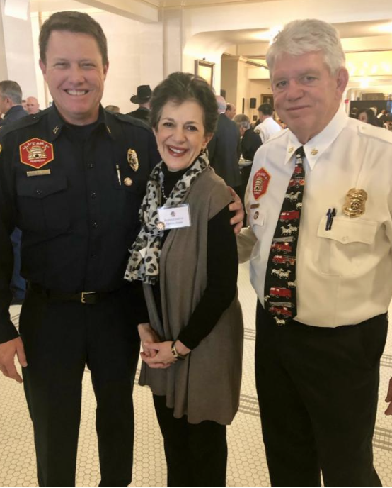 Captain/Paramedic Tony Allred, who was honored at the annual Fire Caucus luncheon, Rep. Arent, and Assistant Chief Rand Andrus