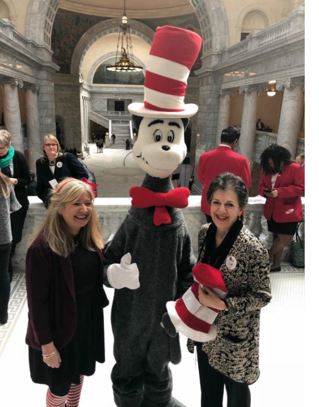 Utah Education Association President Heidi Matthews, the Cat in the Hat, and Rep. Arent on the birthday of Dr. Seuss, which the National Education Association honors as "Read Across America Day"