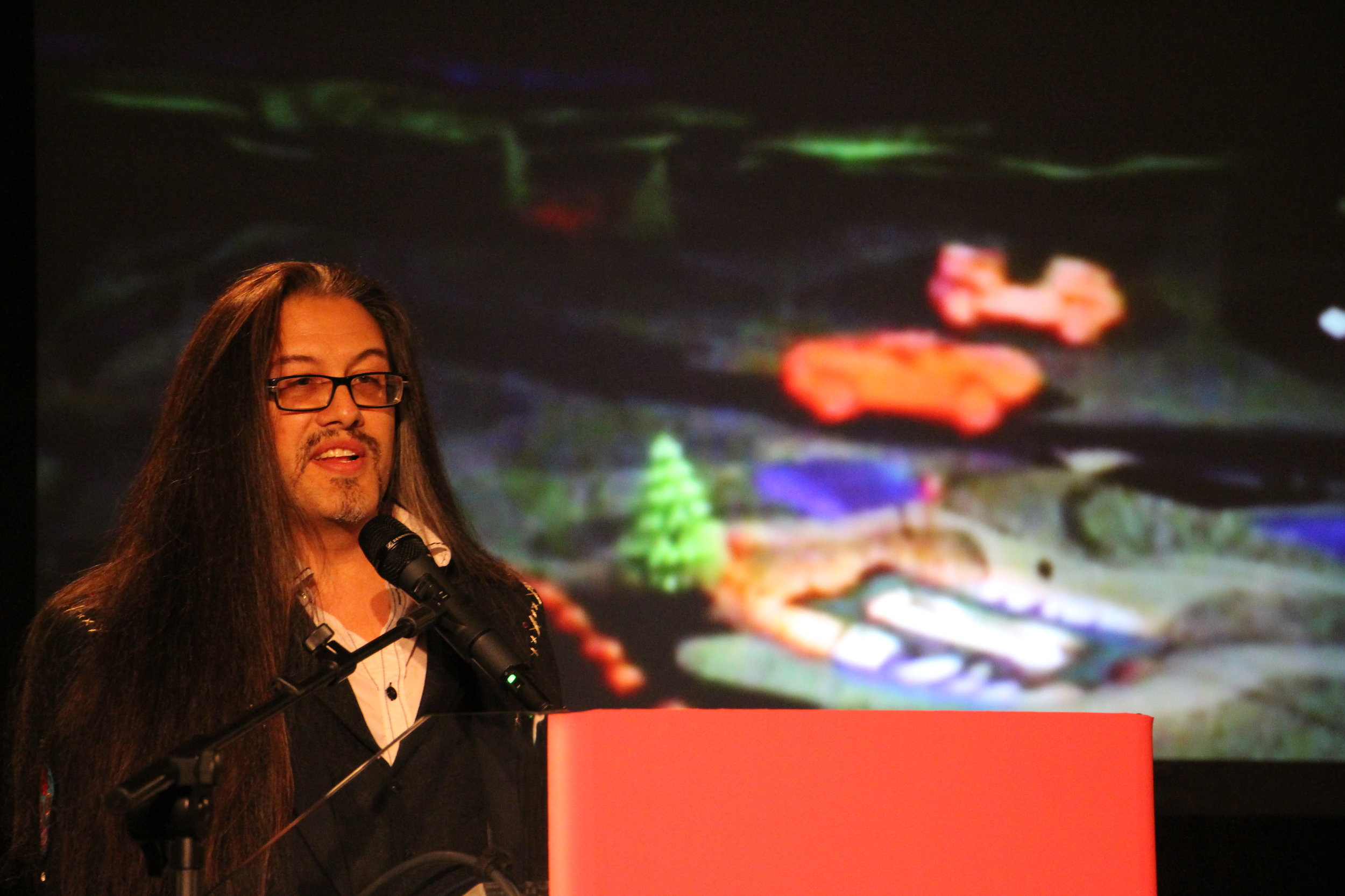 Talk di John Romero con roba sfocata dietro.jpg