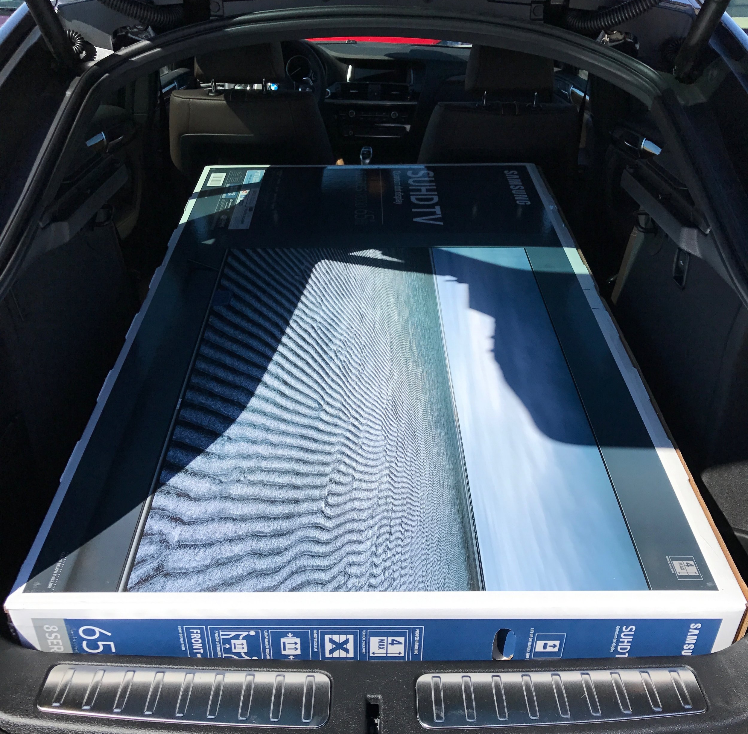The M40i swallows massive boxes for purposes of load testing.