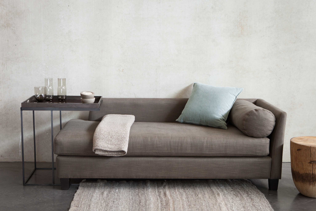 Designer sofa shop tables and Ethnicraft beds.