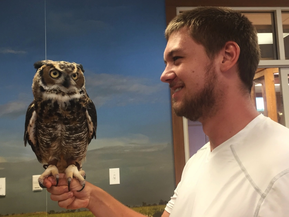 Joe Jenkins with a great horned owl ( Bubo virginianus ) at the Five Rivers Delta Resource Center (Baldwin County, Alabama). Photograph by Timothy J. Walsh.