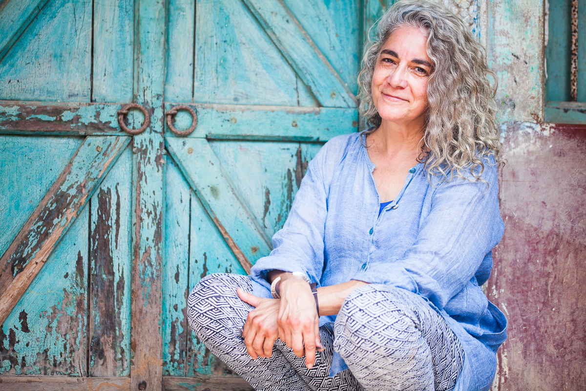 sitting-smiling in doorway  Raghurajpur.jpg