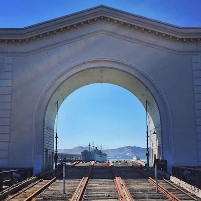 The Jeremiah O'Brien framed by the Pier 43 arch at Fisherman's Wharf