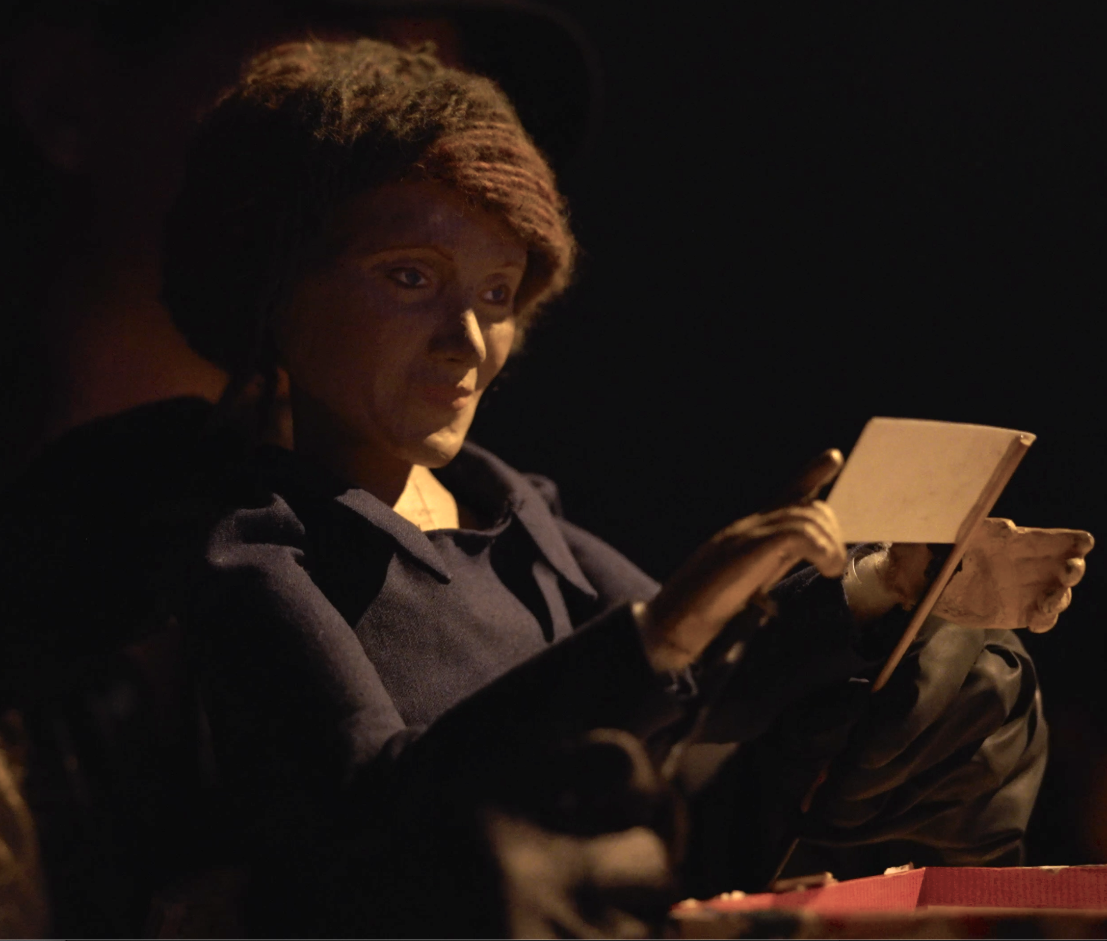 Svetlana looks at a photo