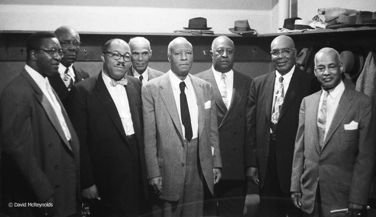 A. Philip Randolph (center, dark tie) was chairman of the event, which was sponsored by the Brotherhood of Sleeping Car Porters and NAACP. Keynote speaker Dr.T.R.M Howard, is third from left. Other IDs will be added as we get them.