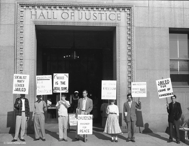 Picket line protesting Vern Davidson’s imprisonment for refusing induction. December 1955. Davidson served two years in prison for his draft resistance. He remained a pacifist throughout his life. (55-29)
