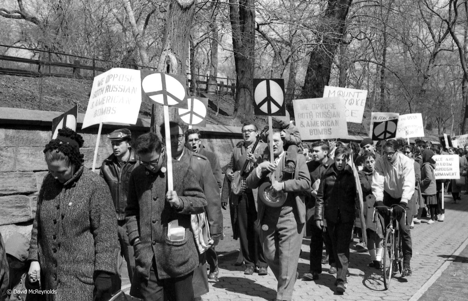  The 1961 peace walk was one of the first to feature the "ND symbol" or peace symbol, which was designed for the Aldermaston anti-nuclear walks in England. The symbol used semaphore code letters for ND for Nuclear Disarmament surrounded by a circle s