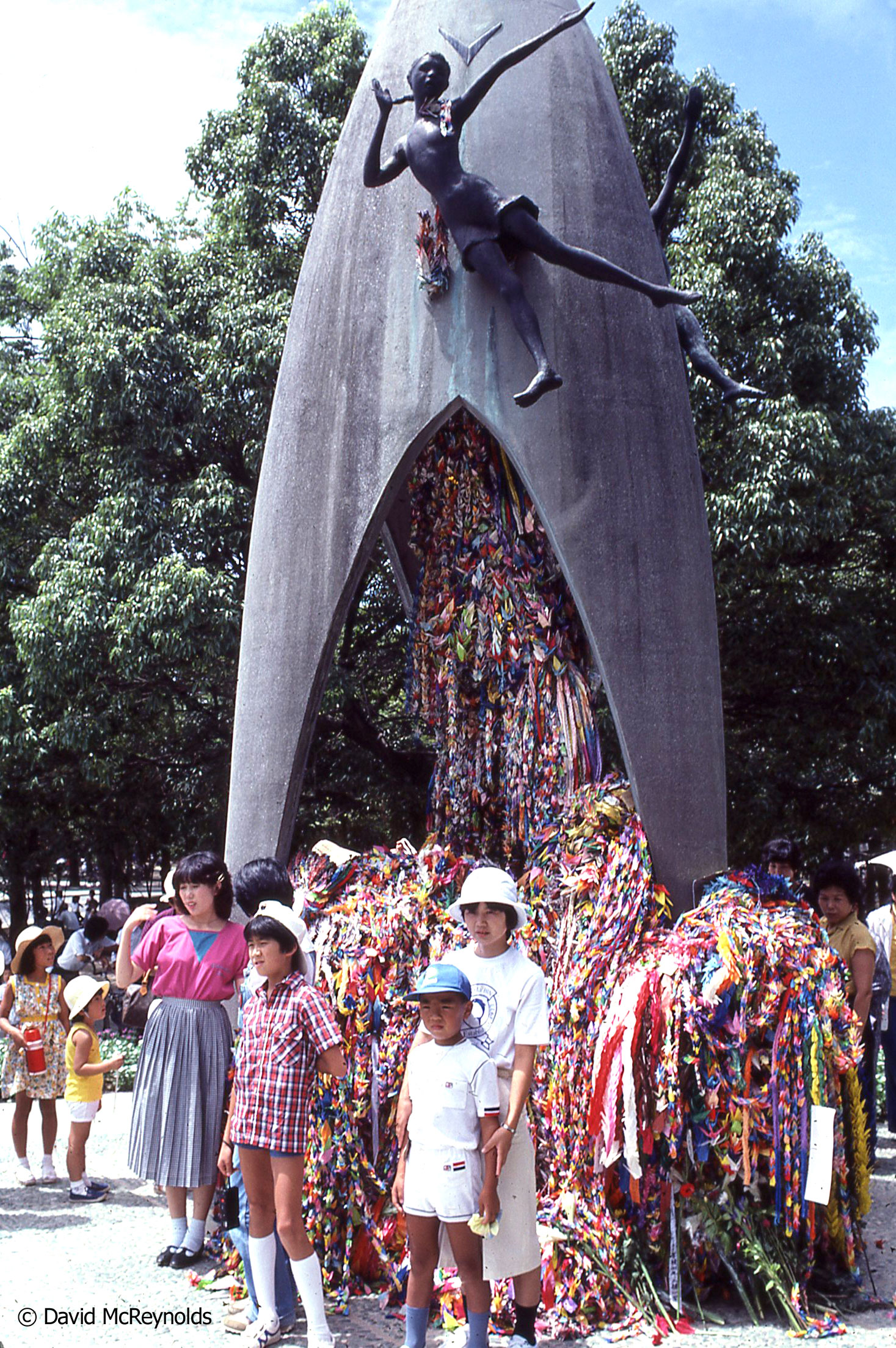 The Children's Peace Monument in Hiroshima honors Sadako Sasaki, who died at age 12 from leukemia, a result of the atomic bombing of Hiroshima. She wanted to fold 1,000 origami peace cranes before she died.