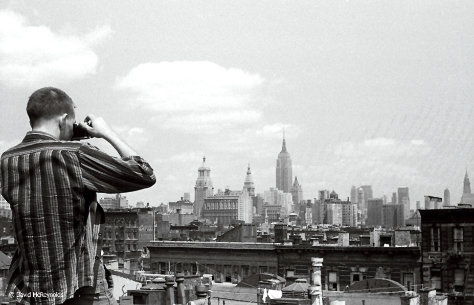  Ben Jaxon and the city from David's apartment building roof at 92 E. First Street, July 1956. (56-22) 