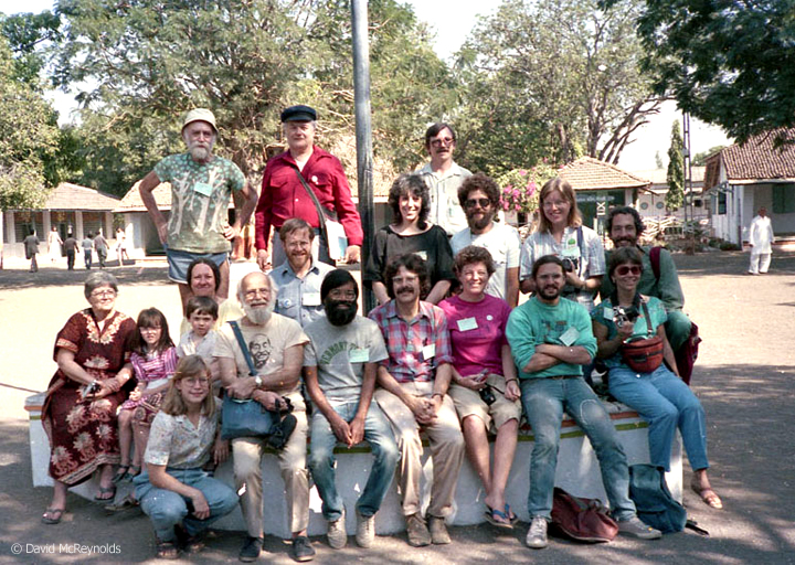 Most members of U.S. delegation to the WRI Triennial. Among those in the photo are WRL staff member Igal Roodenko (standing left back) and Philadelphia Quaker activists Lillian and George Willoughby (Lillian far left, George seated left in Gandhi shirt). New England WRL staff Joanne Sheehan is seated with kids Patrick and Annie Sheehan-Gaumer with Rick Gaumer standing back right.