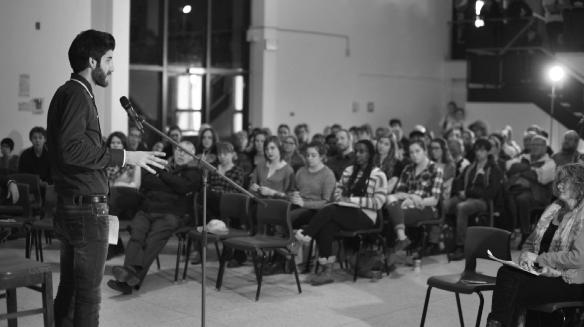 Tareq Hudhud speaks about his experiences as a Syrian Refugee. Photo - Dylan Lawrence