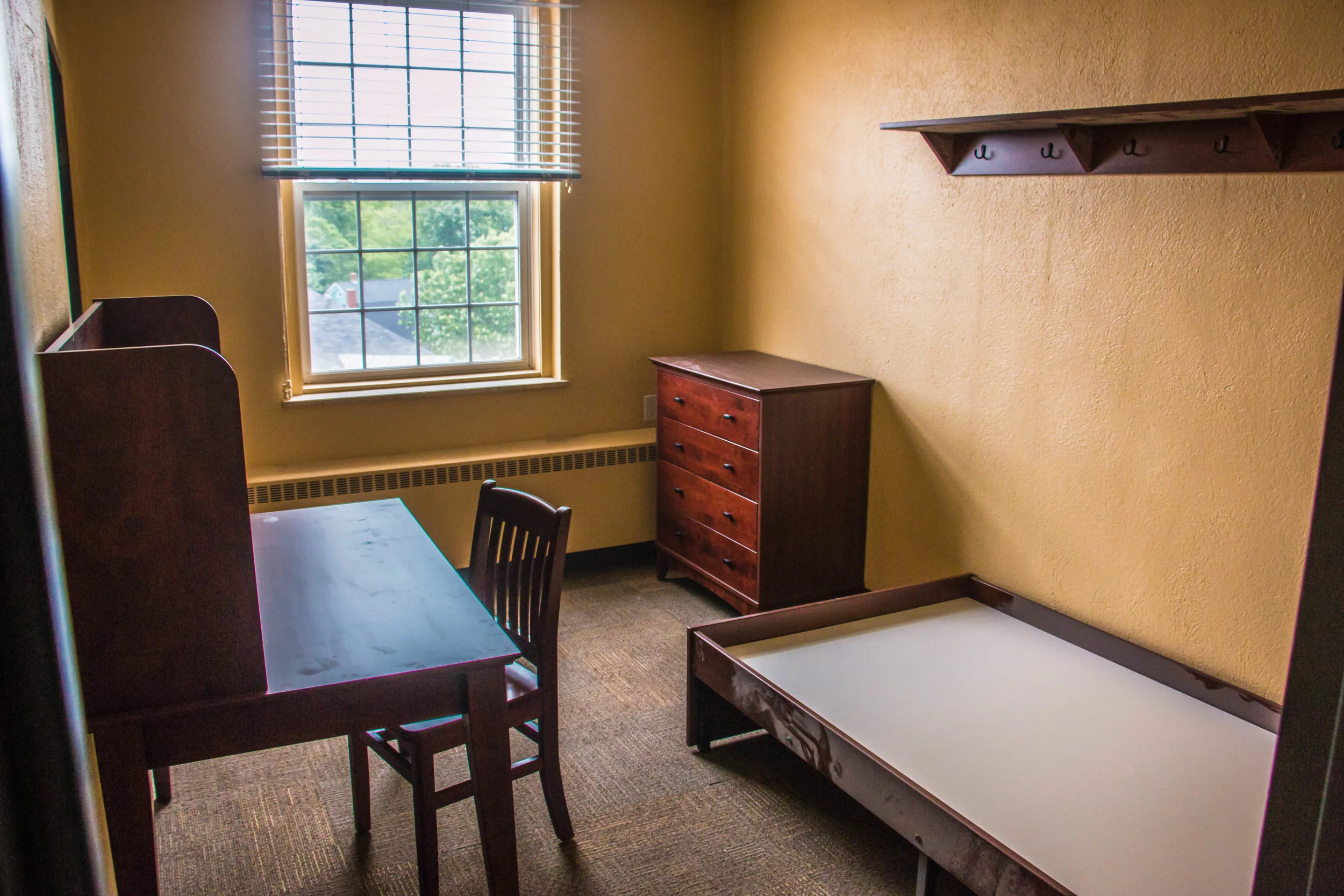 A typical single room in the newly renovated Mount St. Bernard residence. 