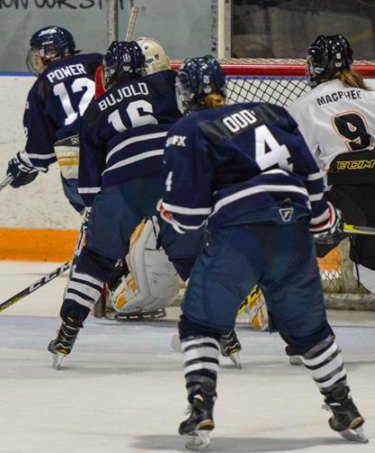 Oddy and the StFX X-Women in action. Photo Credit: David Morash