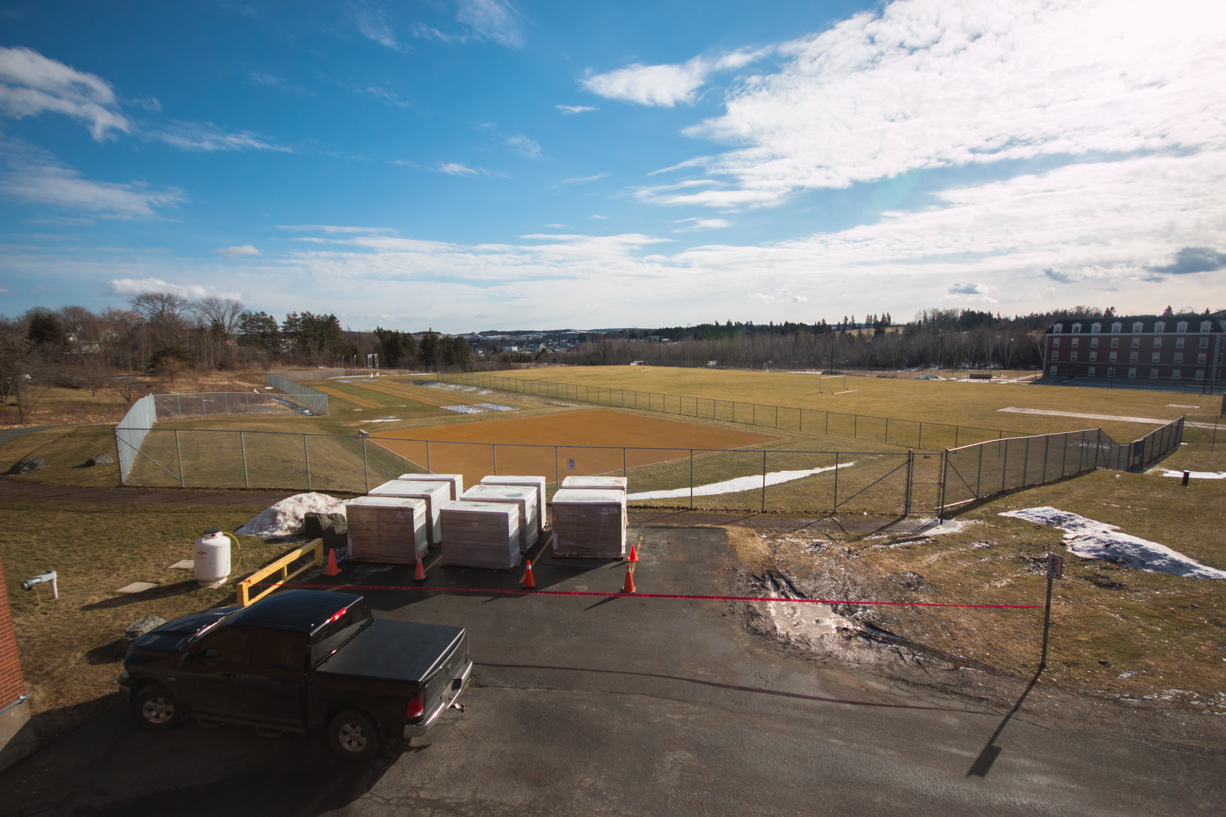  The scene overlooking the soccer and track &amp; field facilities. Prior to their installation, the area was used as field lab space.&nbsp; 