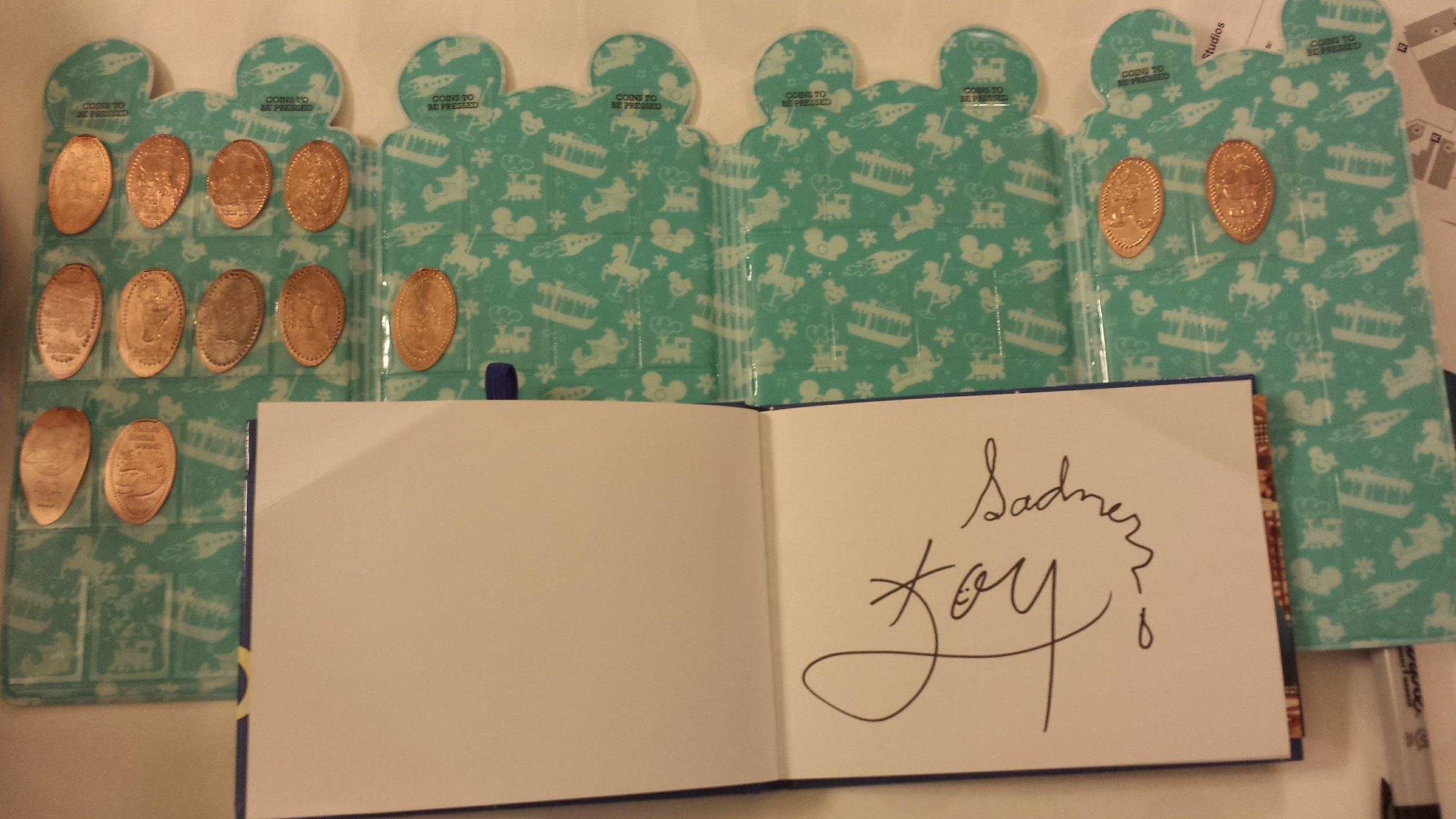 Two pressed pennies (third row), 1 set of signatures, and a couple of resort pennies (right hand side)