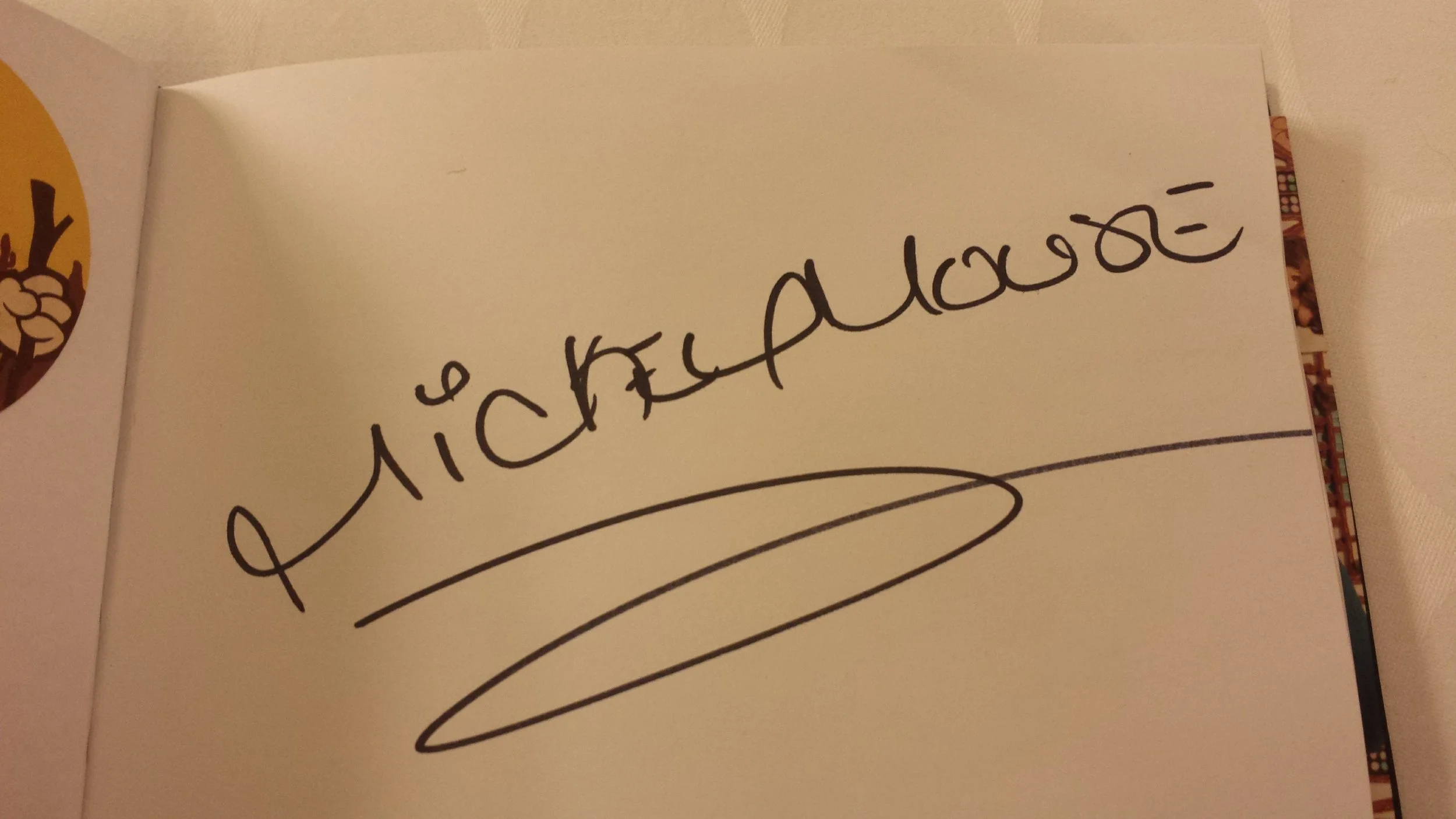An autograph of mickey mouse.