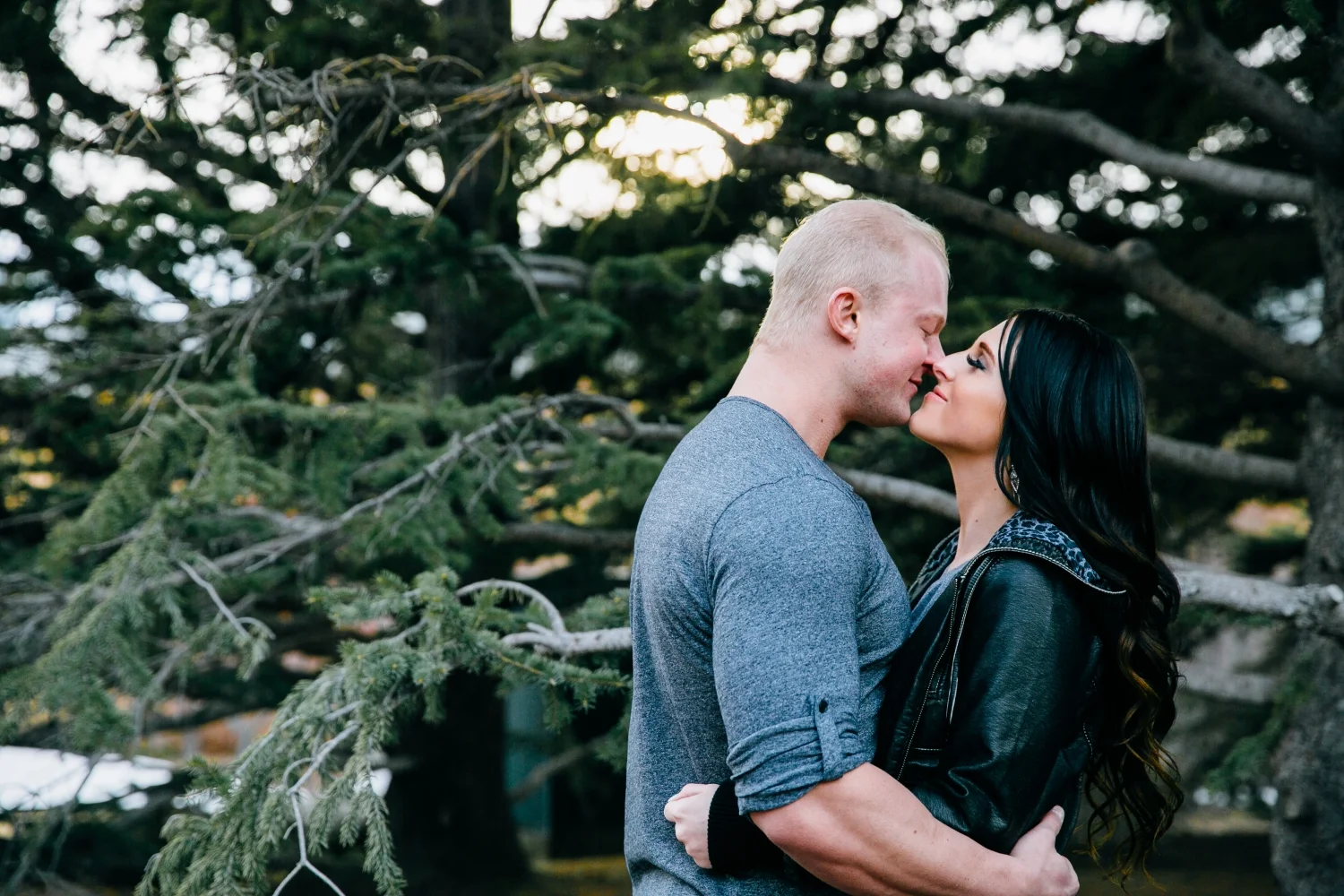 This snowy engagement session has some gorgeous light added to it. And the greens were the ones I always dream of! Lindsay and Travis were meant for this light!