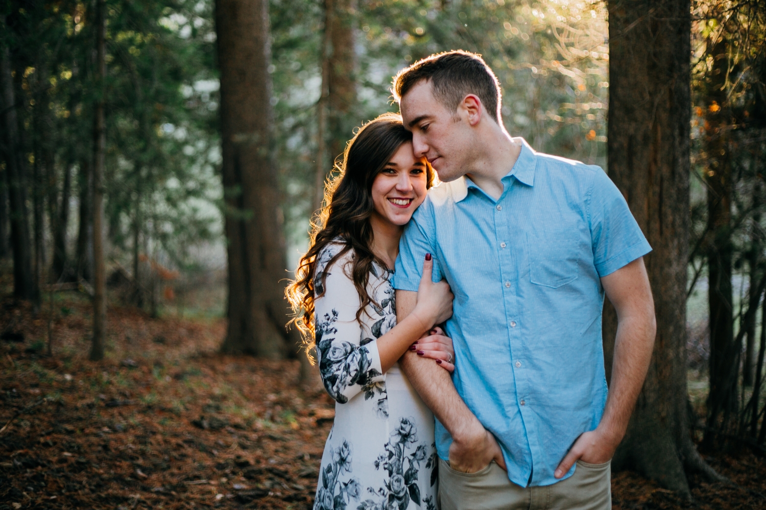 The light barely coming in the grove of trees for Brandie and Chapman's session was the cherry on top. And tall pines are a must. 