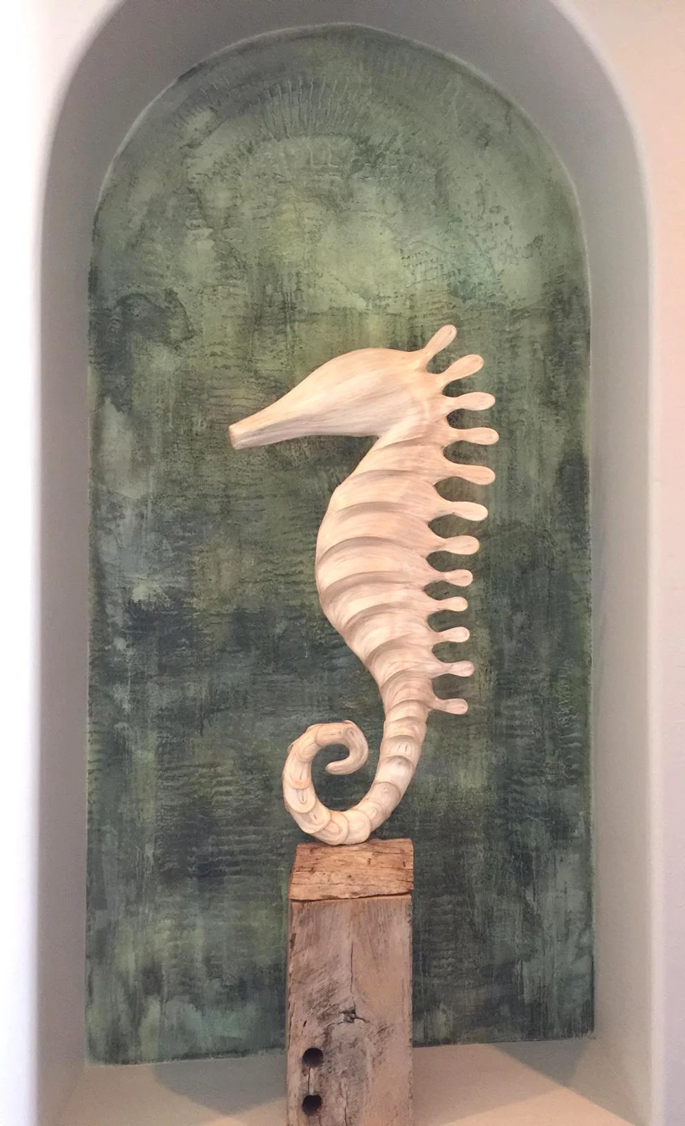  I say make the art niches art themselves. Benefits are many but my favorite are no forcing a specific size of artwork into it, or having to leave it empty for months (years?) while you find just the right thing. Contact me for a consult 