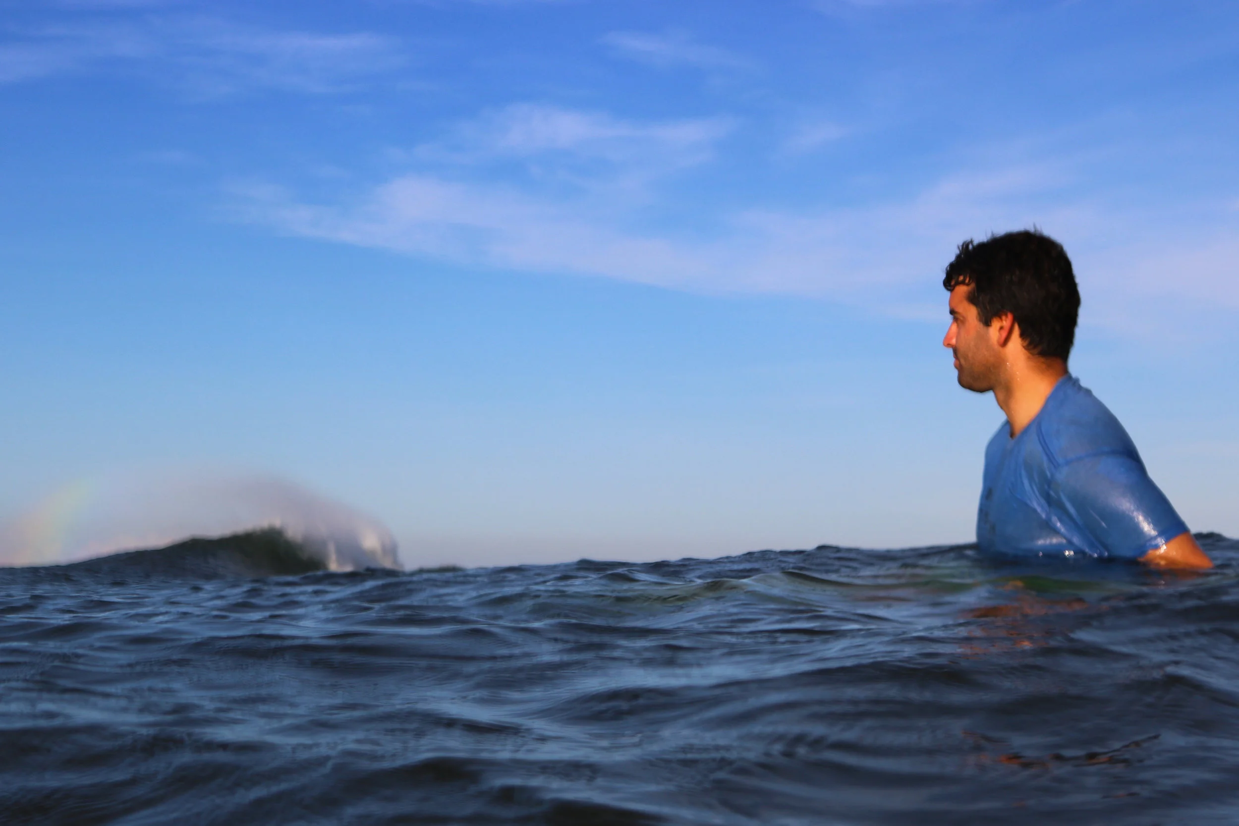 A rainbow off the backwash as Eric waits for the next line. Follow Santa Cruz Surf Lessons on Instagram