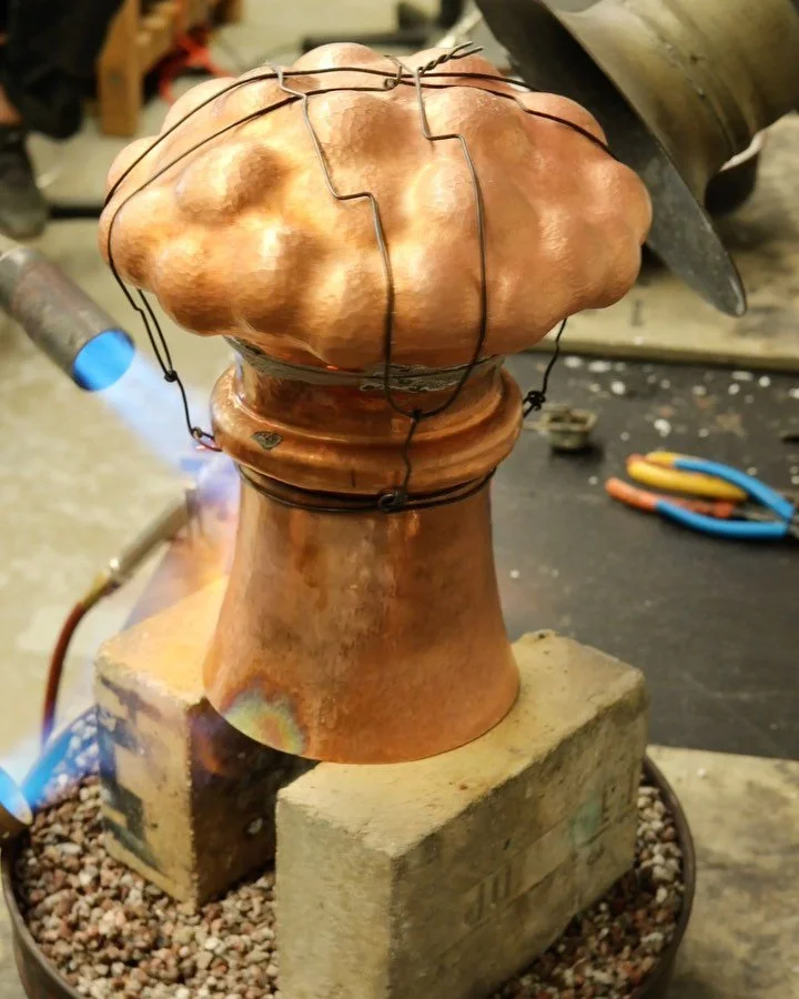 A student project, @jiordi.rosales, has been working on this atomic bomb vase. The top and bottom sections are each raised from an 18ga 12&rdquo; copper disc and then fitted, wired, and hard silver soldered. It was successful on the first attempt!! I