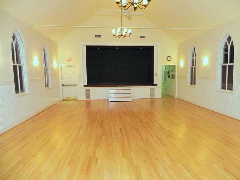 Main hall from the front door. Lighting is warmer and dimmable.
