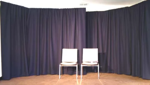 The stage set up with the drapes in place.