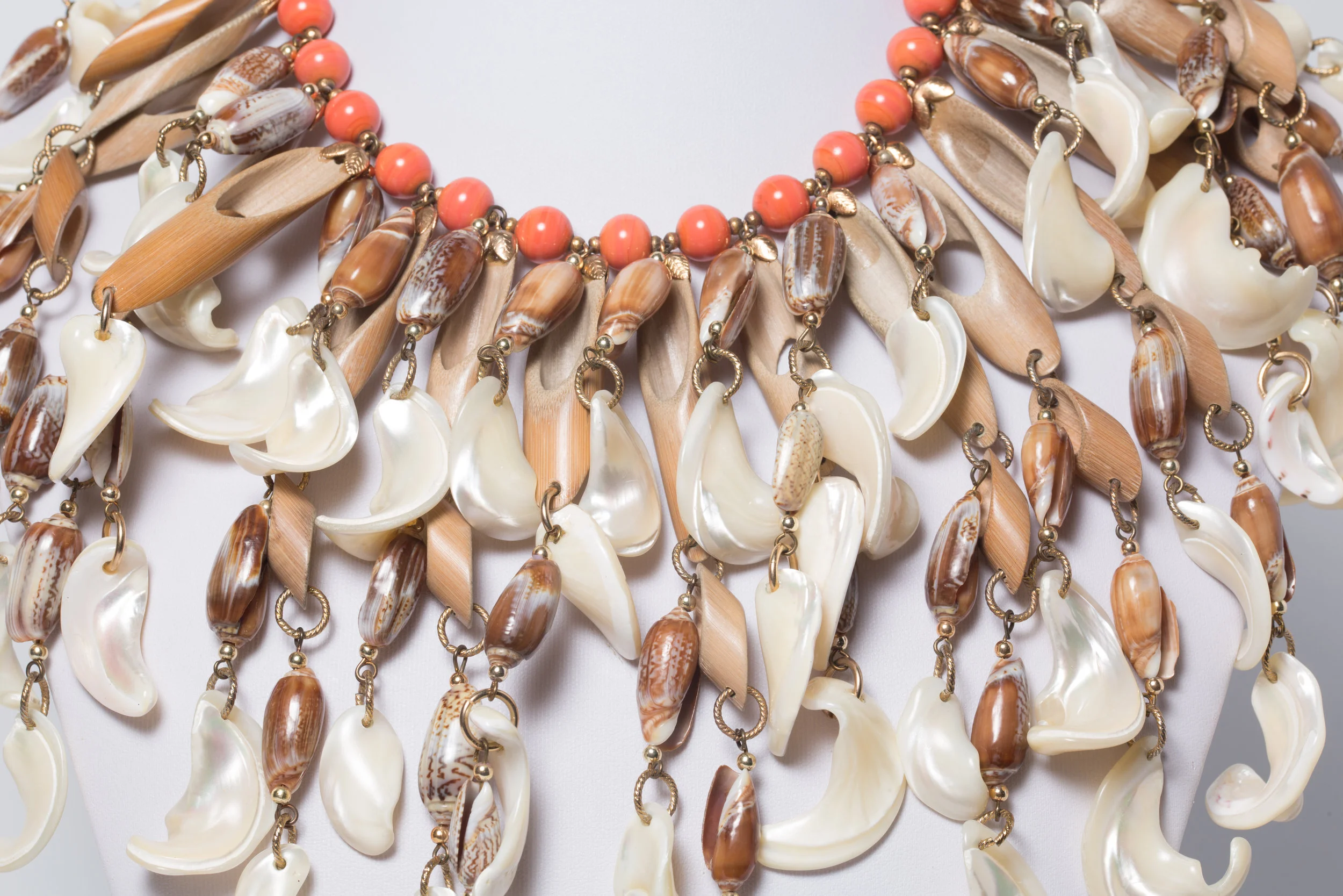  Detail of a sea-shell fringe bib necklace, c.1970's