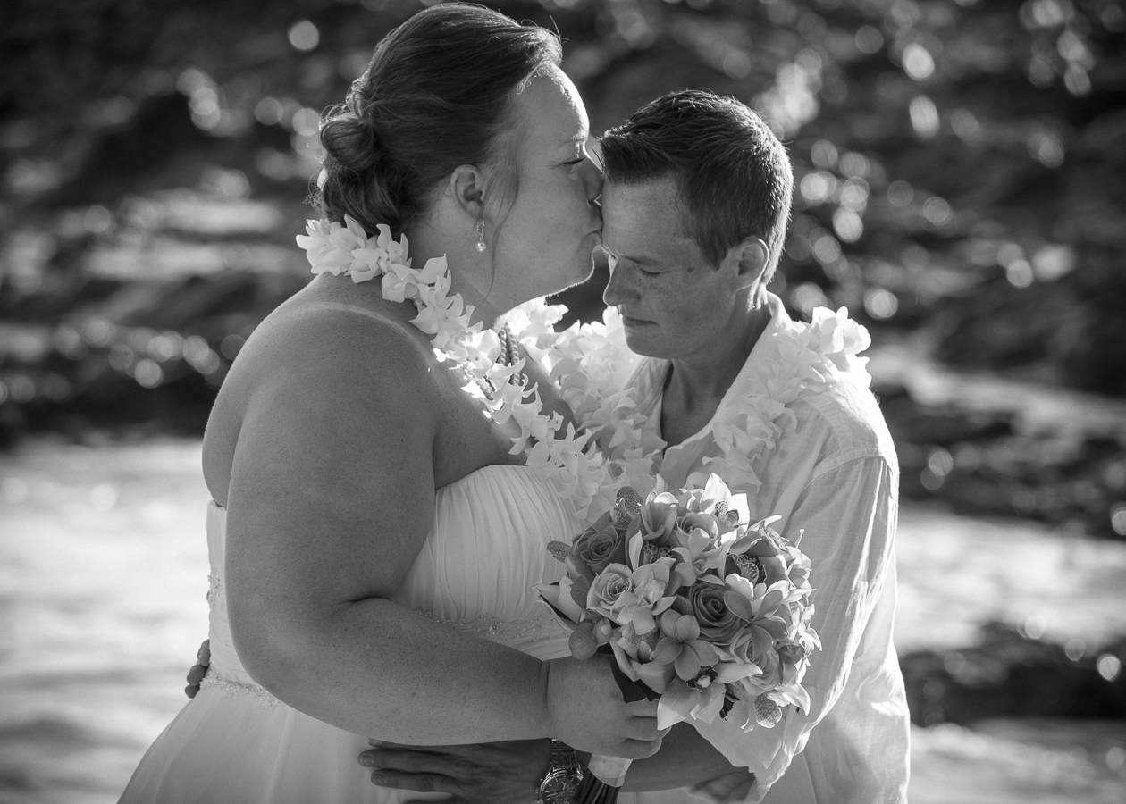 I want to thank you so much for making that video for us. We just watched it and it made us cry. Next to the birth of my son I can honestly say that was one of the best days of my like. I am truly blessed to have the most amazing son and now the most amazing wife. I have gained an incredible family and am blessed with wonderful friends who traveled so far to watch us get married. On this journey we found amazing people to fulfill our wishes on this most important day, that is so special to us. You all made our day that much more personal and we had no expectations going into it, other than being married on the most beautiful beach we had ever been to. We are humbled by our experience, Maui is just that much more special to us now. Thank you from the bottom of our hearts ~Brandi and Kim