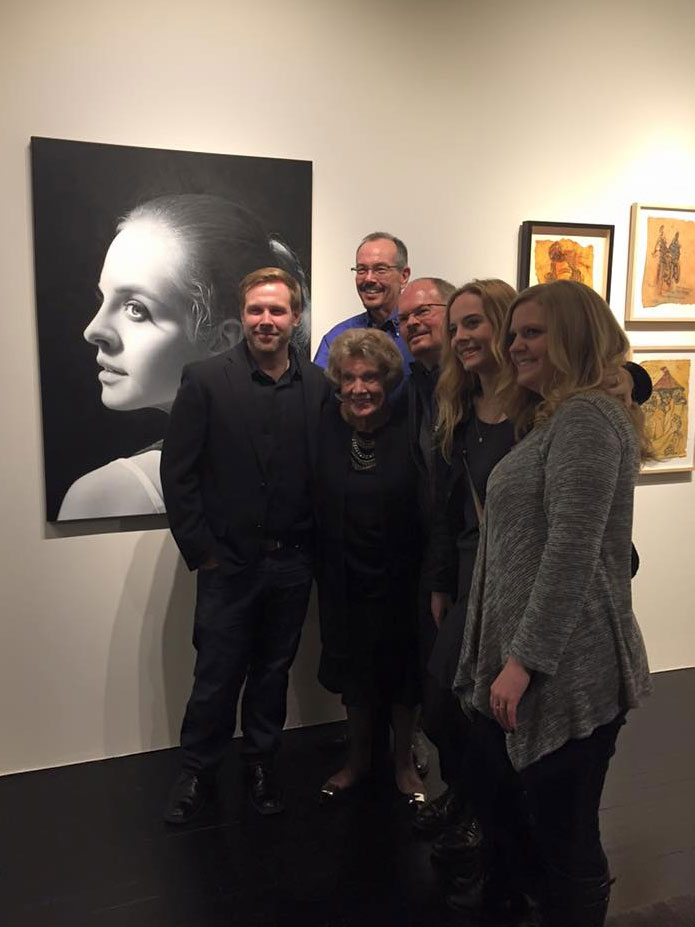 My wife Amber and I posing in front of the painting "Emily" with Emily, Marlana (owner of Hammond Harkins), and Ric and Doug who added the painting to their collection.