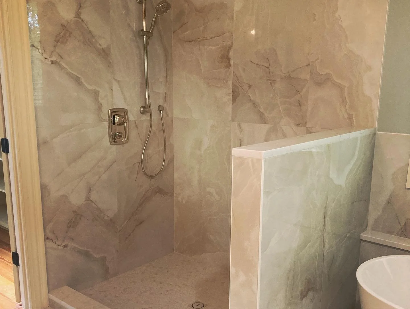 Here&rsquo;s another bath we finished up this week. The last picture is the old tub before we took it out.