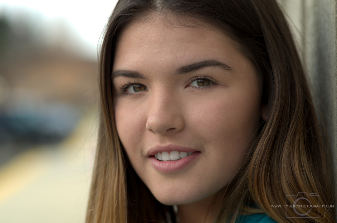 This image has been retouched after processing to even skin tone, remove blemishes, and whiten teeth.