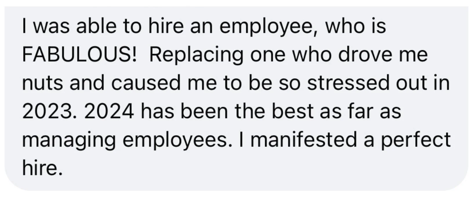 Message from a private coaching client describing how she manifested a perfect hire, replacing an employee who had caused her significant stress in 2023, making 2024 her best year yet for managing employees