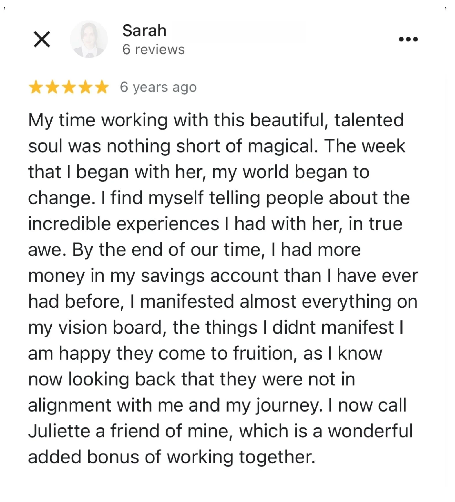 Google review from Sarah describing how she manifested almost everything on her vision board and had more money in her savings account than ever before, through private coaching with manifestation coach Juliette Kristine and The Surrender Approach