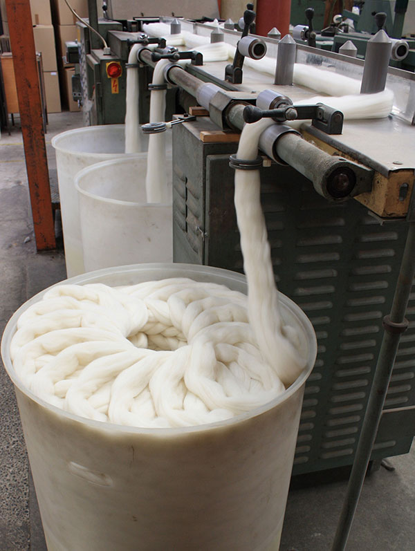 WGW roving going through the gilling machine at Design Spun.
