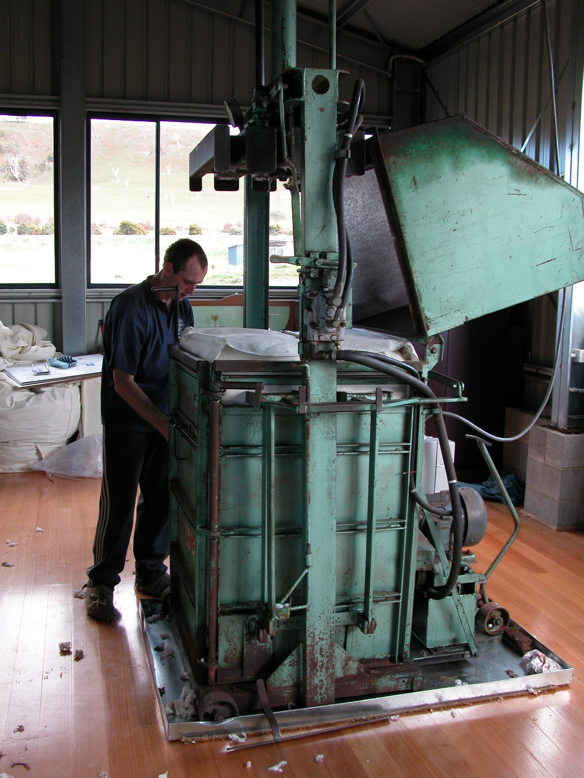Jamie finishing off a pressed bale