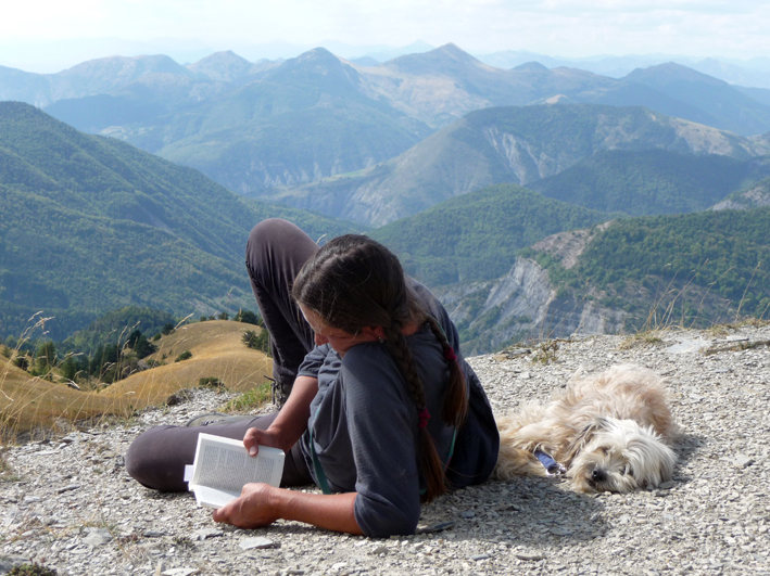 Shepherdess Marie Labreveux and canine colleague at midday rest