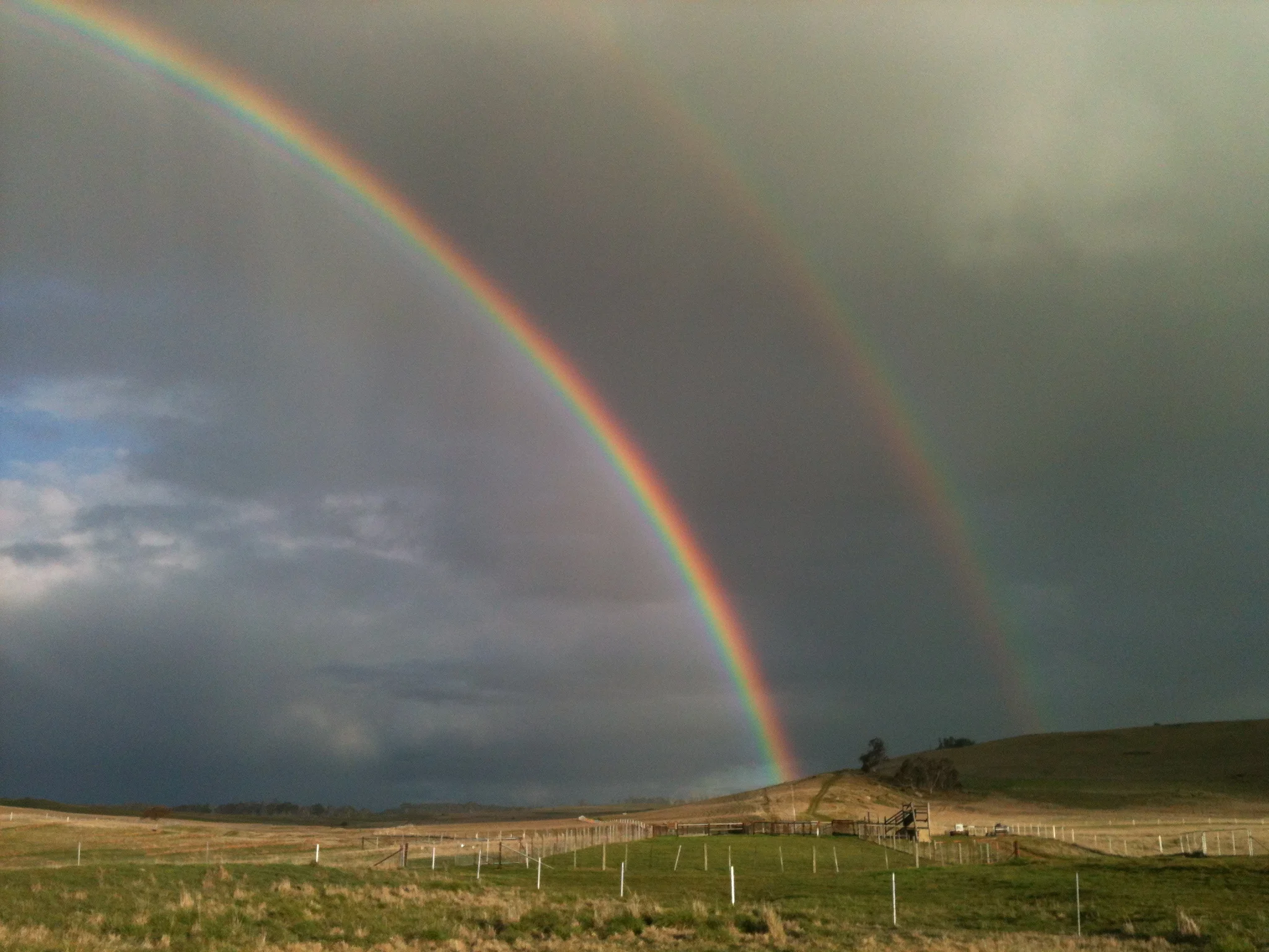 he old yards lit up by a lovely double rainbow in early September. Not much rain, sadly, but a good show nonetheless.
